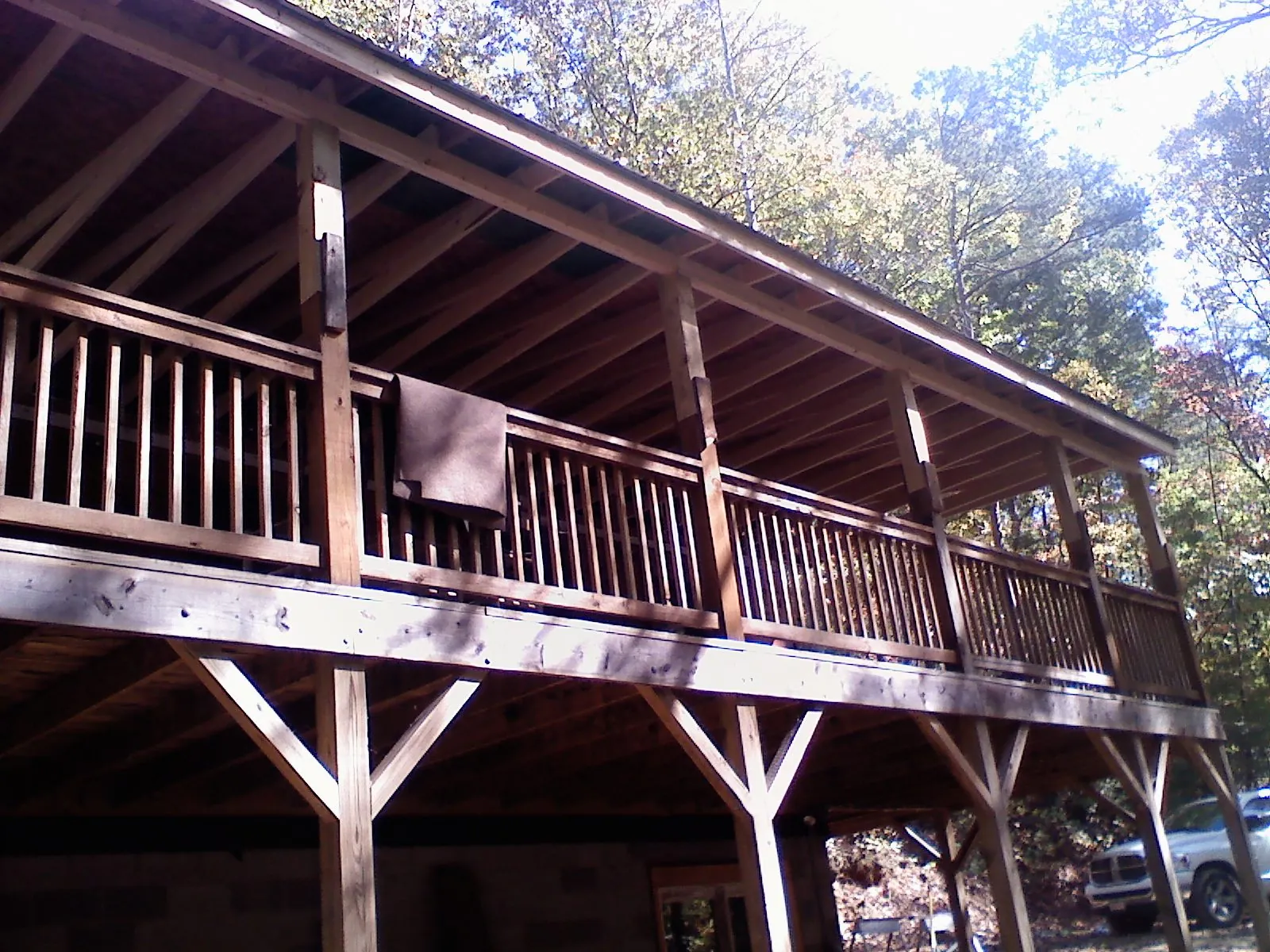 Timber framing under a new elevated porch and deck — Roof Leak Repair in Island by Roofing Brothers